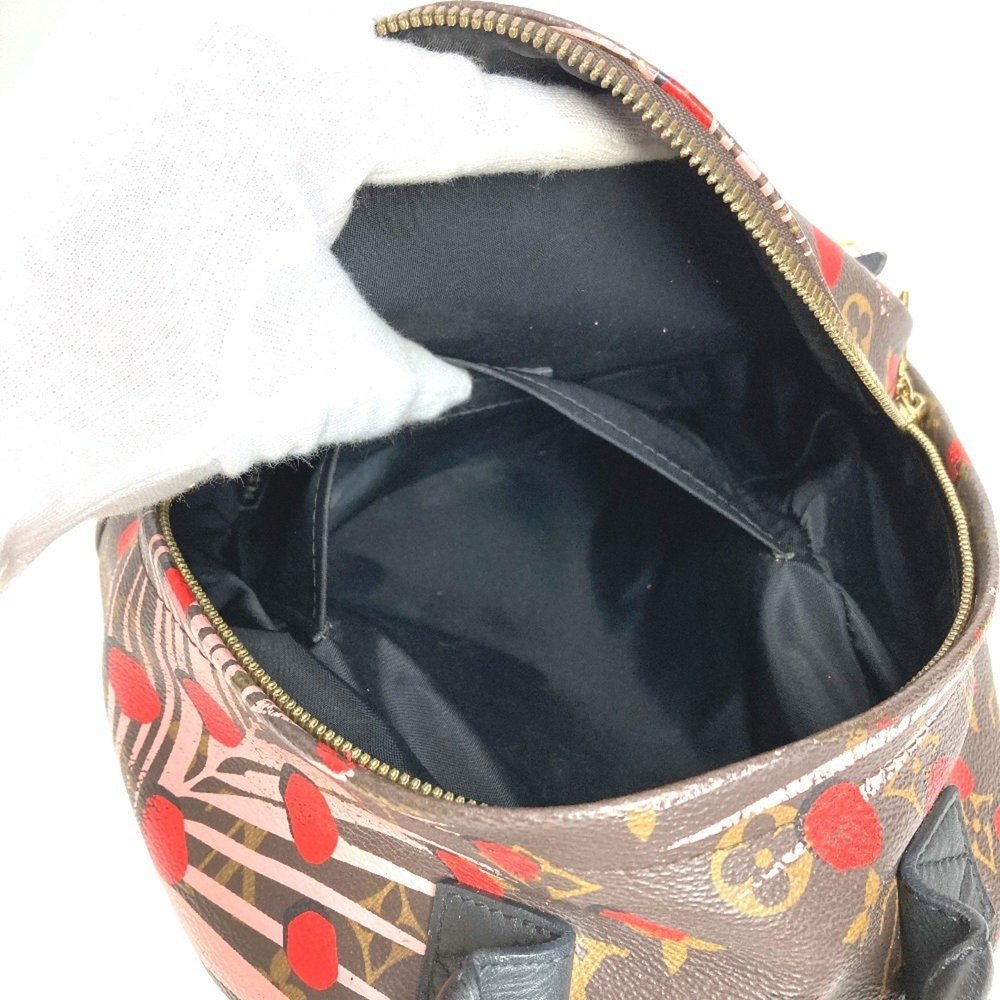 LOUIS VUITTON Brown Monogram Canvas Backpack - Picture 14 of 16